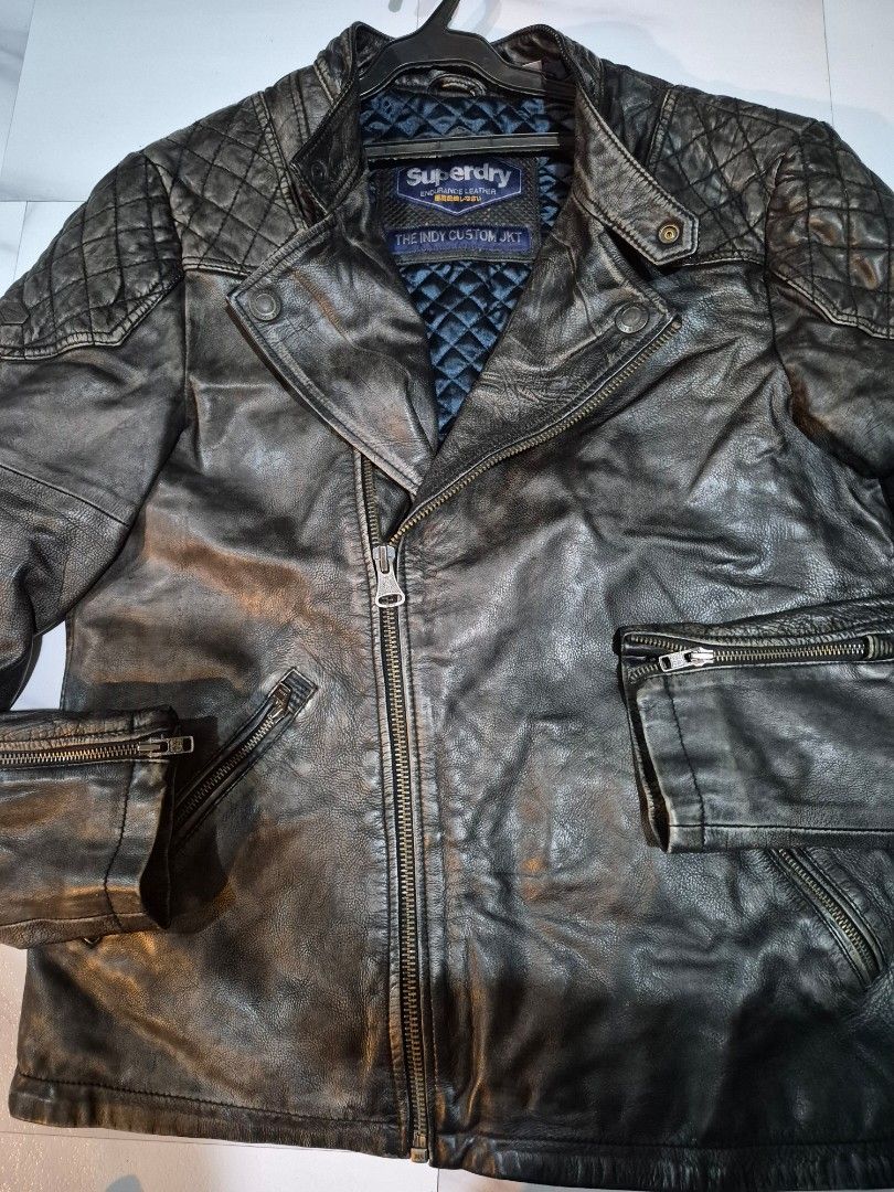 Superdry biker leather jacket (Category: Coats, Jackets and Outerwear) located in Baguio. Submitted by amarilesbacagan2.tiger (Listing ID 1465890622, Image 2). Description: SUPERDRY GENUINE BIKER JACKET HEAVY Makapal NO FLAWS 19 SHoulder length 21 Bustl 27Length 3,500+SF BEST FITS LARGE BAGUIO location jnt ship pay first no cod MABINI DA PM IF INTERESTED.