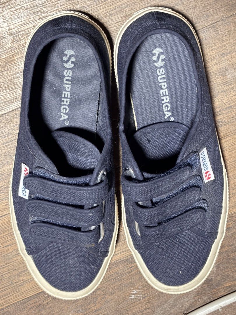 Superga Dark Navy Velcro Canvas Sneakers (Category: Sneakers) located in Caloocan City. Submitted by ronnikins (Listing ID 1465860480, Image 2). Description: - Brand: Superga - Color: Dark navy blue - Closure: Triple hook-and-loop straps - Sole: White rubber sidewalls - Details: Signature branding on sides and insoles - Design: Low-top with comfortable fabric lining - Condition: Used a few times, box got wet so had to throw it away RFS: Declutter