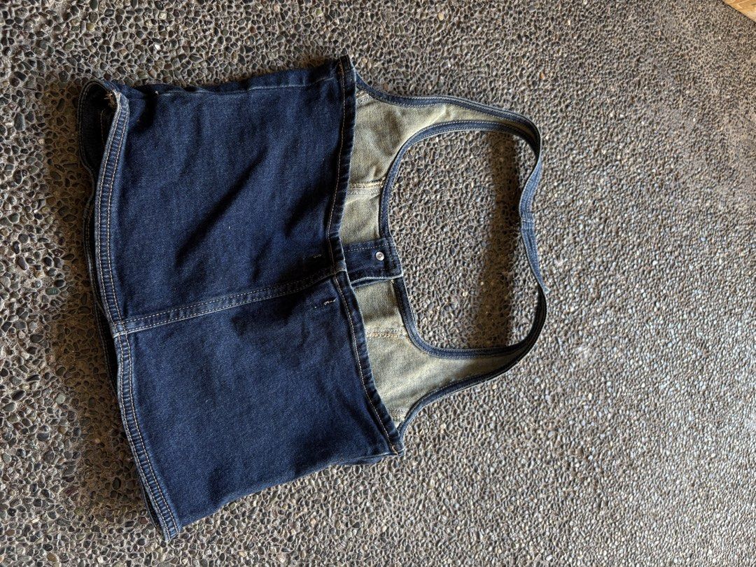 Supré Denim Halter Crop Top Size 10 (Category: Sleeveless) located in San Fernando. Submitted by gigikyla (Listing ID 1465922011, Image 3). Description: - Brand: Supré - Style: Dark wash denim halter top with a square neckline and structured panels - Details: Button-down front closure with four metal buttons, clean back with vertical seam - Size: 10 - Condition/Vibe: Great Y2K aesthetic, perfect for casual wear.