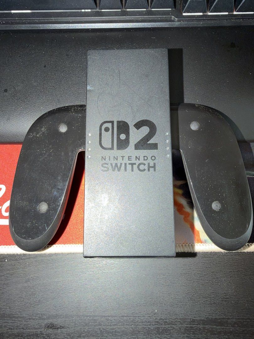 Switch 2 Controller Grip (Category: Controllers) located in Singapore. Submitted by laez1309 (Listing ID 1465844036, Image 1). Description: Used Switch 2 Joycon Grip Lightly used, a few small scratches .