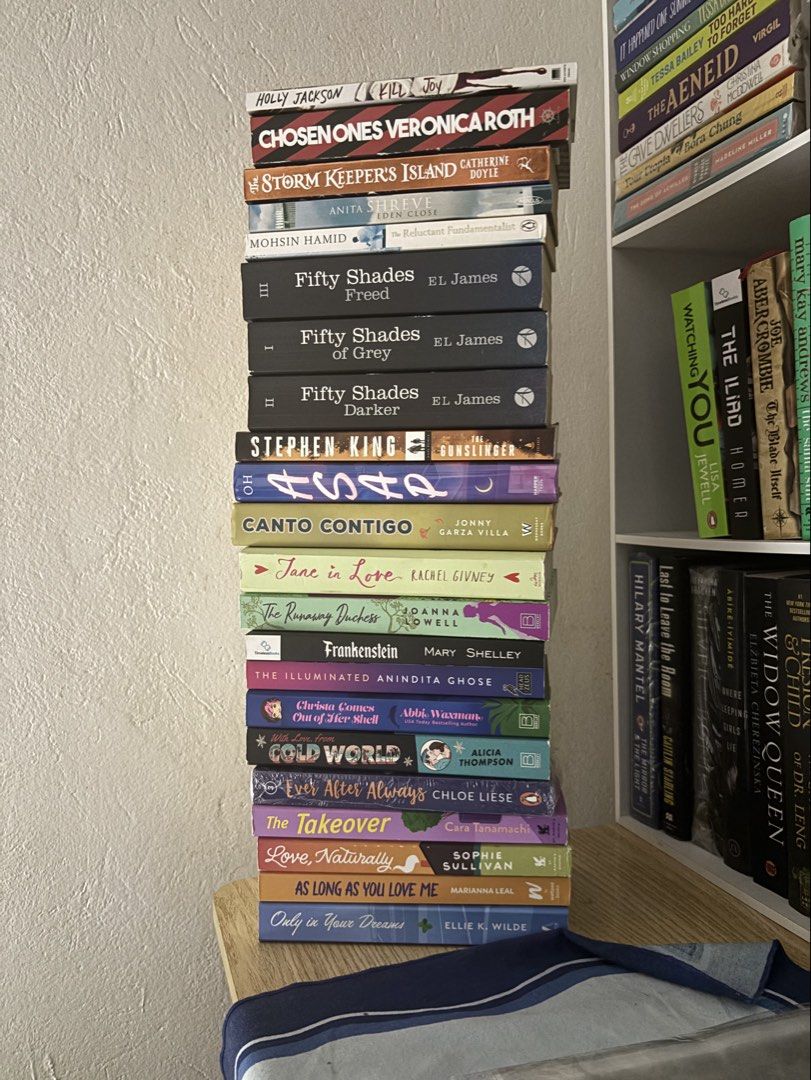 TAKE ALL BOOKS (Category: Storybooks) located in Baguio. Submitted by kewlfinds (Listing ID 1465894951, Image 1). Description: - Massive stack of paperback books for sale - Featured authors and titles: Stephen King, Fifty Shades trilogy, Veronica Roth, and contemporary romance - Great mix of genres and authors - Available as a full bundle or per individual title upon request - Perfect for book lovers looking for their next great read.