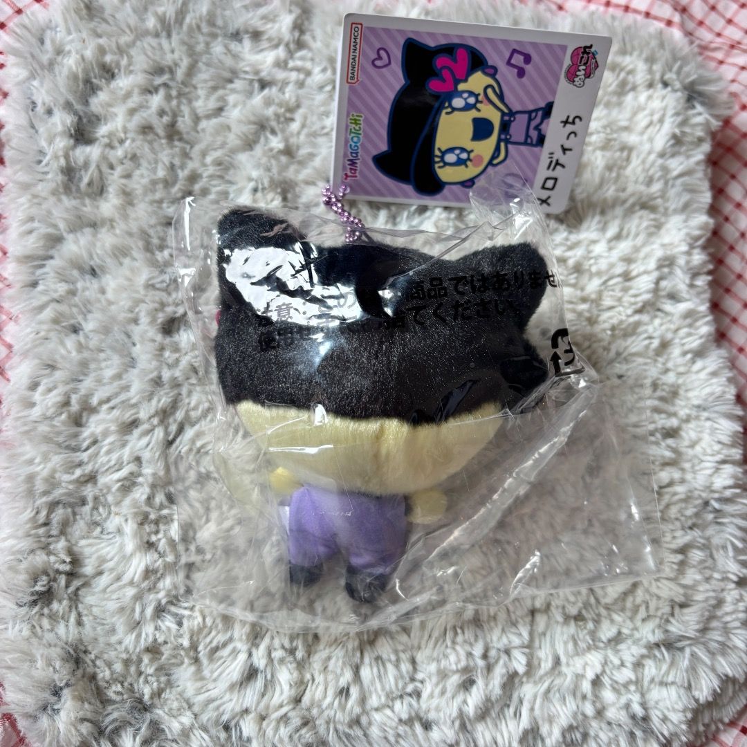 Tamagotchi Plushie - Melodytchi (Category: Plushies & Soft Toys) located in Marikina City. Submitted by majo-esguerra (Listing ID 1465780263, Image 2). Description: Brand new unopened Melodytchi plushie. RFS: Decluttering Can do same-day delivery via Grab and Lalamove within Metro. Can ship via LBC for around 50php..