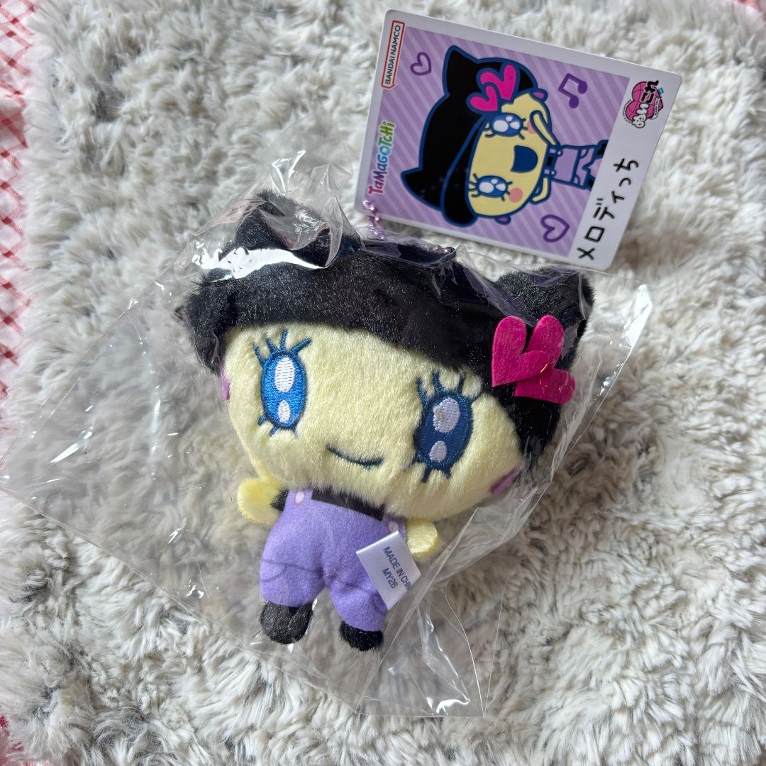 Tamagotchi Plushie - Melodytchi (Category: Plushies & Soft Toys) located in Marikina City. Submitted by majo-esguerra (Listing ID 1465780263, Image 1). Description: Brand new unopened Melodytchi plushie. RFS: Decluttering Can do same-day delivery via Grab and Lalamove within Metro. Can ship via LBC for around 50php..
