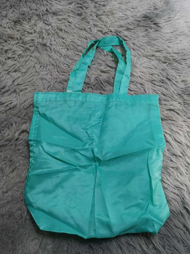 Teal Eco Durable Tote Bag (Category: Tote Bags) located in Santa Cruz. Submitted by jmy_surplus.2 (Listing ID 1465881344, Image 1). Description: Size ; L - 12 W - 10.3 Color ; Teal Type ; Tote Bag Brand ; No brand Material ; Nylon Style ; Teal Lightweight Tote Bag LR 129 JMY 5 Batch #224.