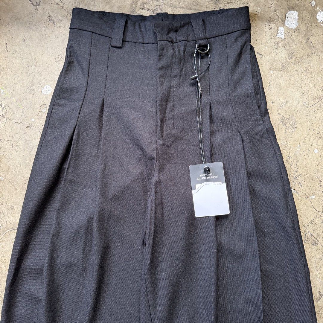 Team Wang - Acceptance Pleated Wide Trouser (Category: Trousers) located in Cavite. Submitted by 4118.ph (Listing ID 1465867226, Image 3). Description: Size 0 fits 28 Unisex Deadstock Waist 14” Length 41.5” Inseam 26.5” Leg opening 12.5”.