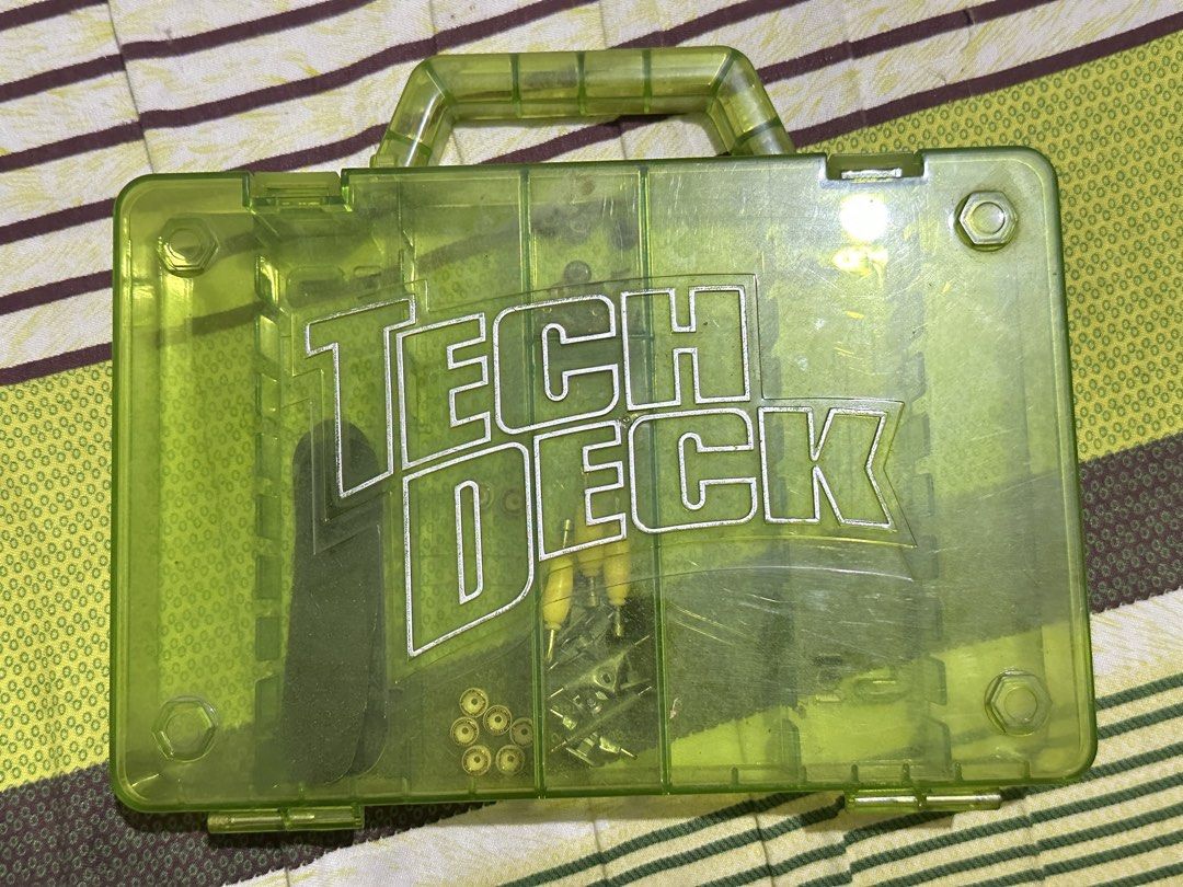 Tech Deck Fingerboard Skateboard Set (Category: Vehicle & Diecast Models) located in Floridablanca. Submitted by prelovedlovebyjl (Listing ID 1465916326, Image 3). Description: -Inclusions: 3 fingerboards, original case, and extra spare parts/accessories. -Please see photos for actual condition. 🛹 -Negotiable -Location: Floridablanca, Pampanga if interested just message me, thank you!! :>.