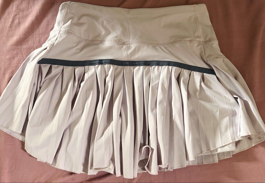 Tennis Pickleball Skirt (Category: Activewear) located in Butuan. Submitted by slownsteady_ (Listing ID 1465814317, Image 2). Description: - Color: Light pastel purple - Size: Small to medium - Material: 80% polyester, 20% spandex (smooth, lightweight, and stretchy) - Features: Built-in shorts for active movement and elastic waistband with contrast dark piping - Versatile: Great for tennis, golf, or daily casual wear - Condition: Brand new with t
