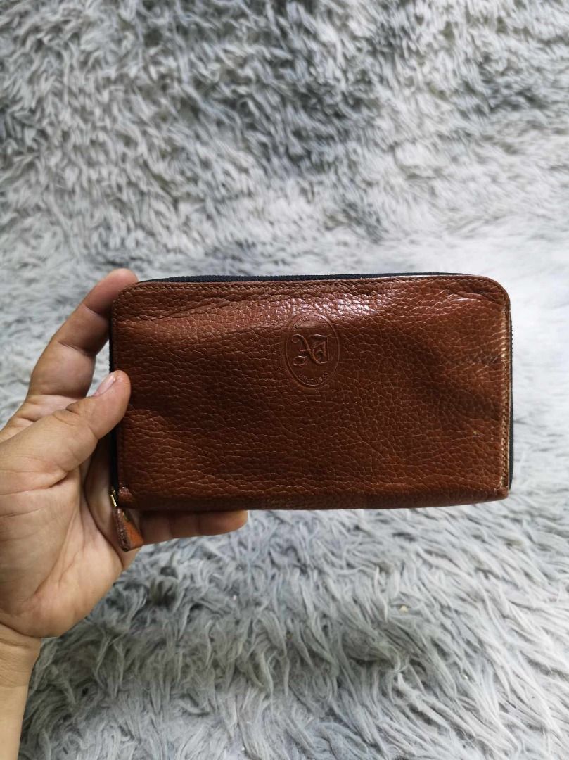 Textured Brown Leather Zip Around Wallet (Category: Wallets & Card holders) located in Santa Cruz. Submitted by jmy_surplus.2 (Listing ID 1465893392, Image 3). Description: Size ; L - 4.6 W - 7.6 Color ; Brown Type ; Wallet Brand ; No Brand Material ; Leather Style ; Brown leather Zipper Closure Wallet LR 129 JMY 5 Batch #224.