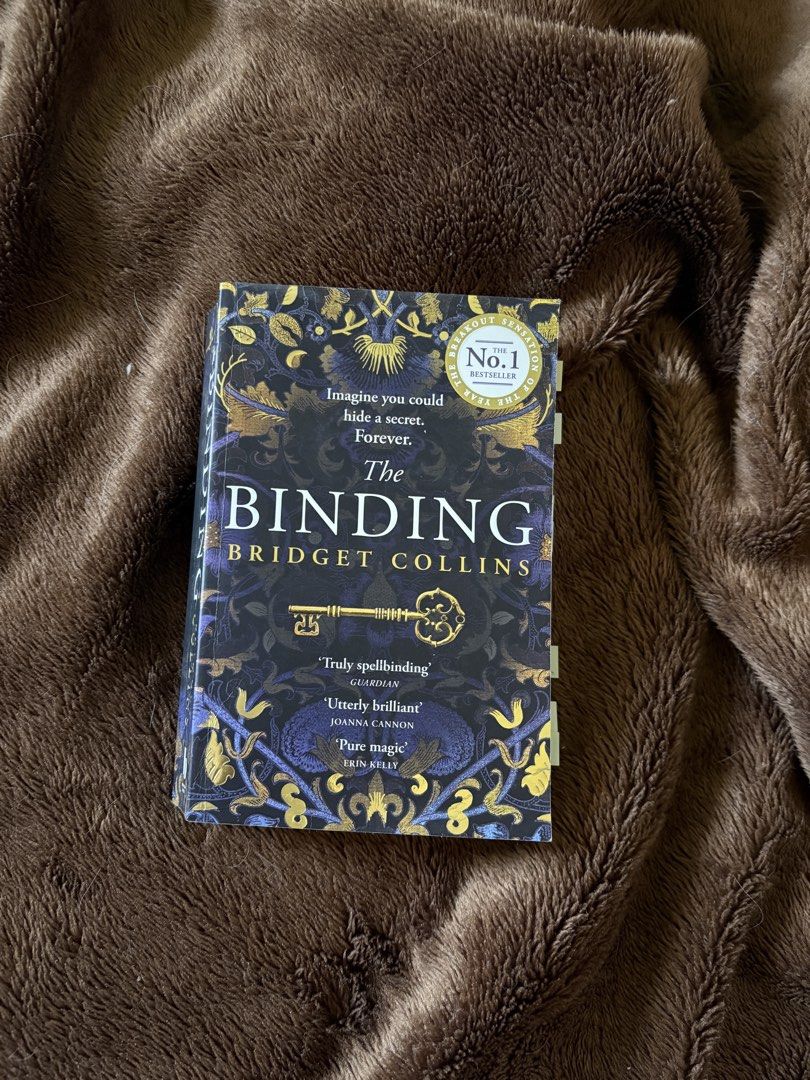 The Binding - Bridget Collins (Category: Storybooks) located in Mexico. Submitted by itsbuttertoooooo (Listing ID 1465763671, Image 1). Description: Condition: 9.5/10 (light crease) Bought from: Big bad wolf *sticky strip/label will be removed before shipping..