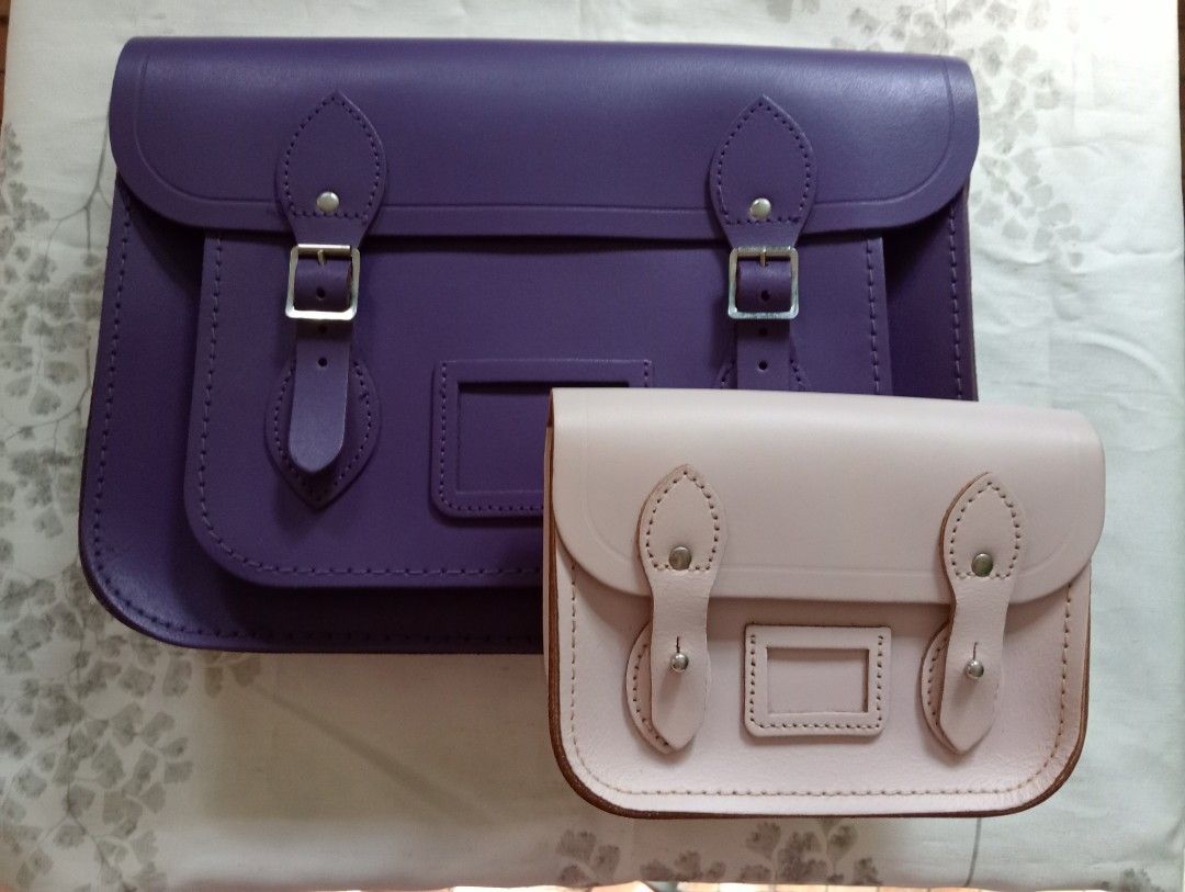 The Cambridge Satchel Company bundle (Category: Luxury Bags & Wallets) located in Bacoor. Submitted by anarkaye (Listing ID 1465860739, Image 1). Description: Authentic Cambridge Satchel Company Genuine Leather The Tiny Satchel (Micro) Pastel Pink 13 inch Satchel Violet.