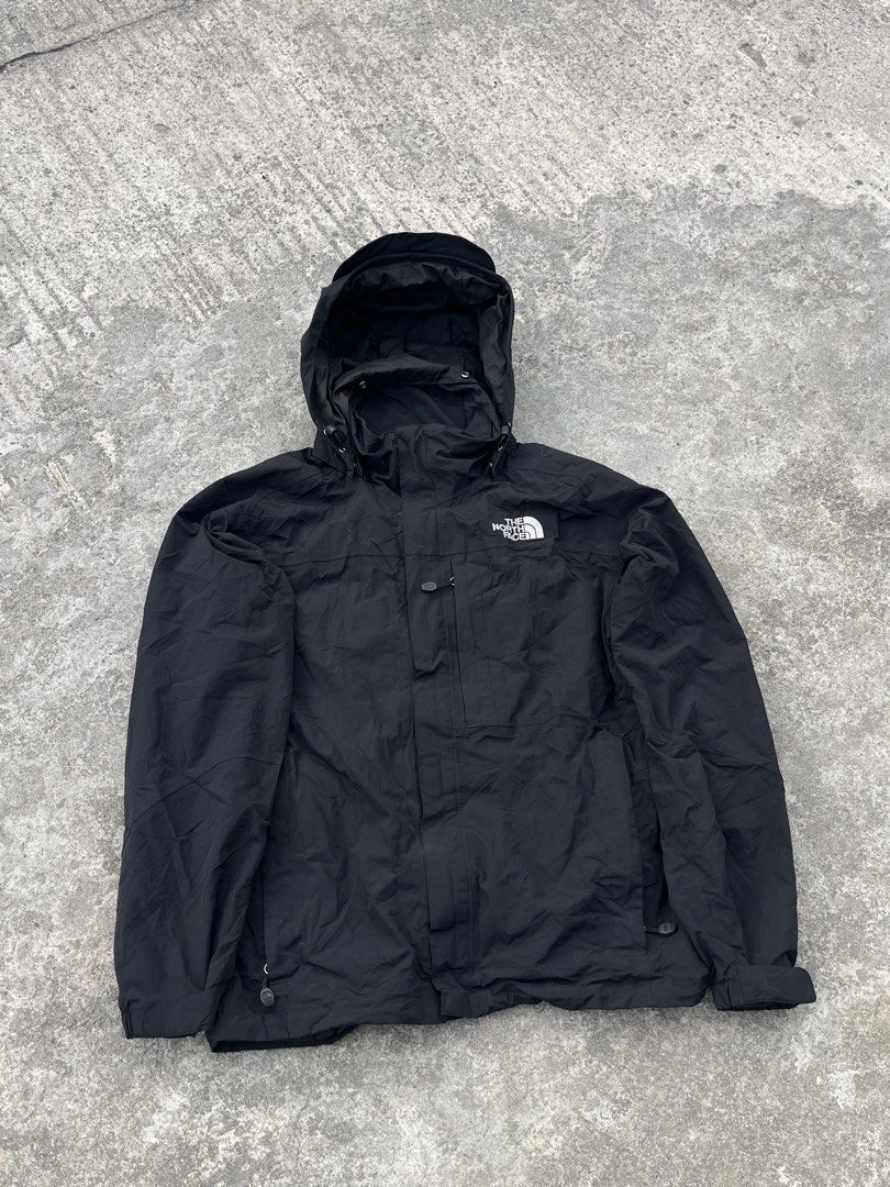 The North Face Black Waterproof Hooded Jacket (Category: Coats, Jackets and Outerwear) located in Manila. Submitted by zentree_04ef04 (Listing ID 1465832003, Image 1). Description: - Brand: The North Face - Color: Classic Black - Condition: Excellent / Pre-loved - Waterproof outdoor jacket designed for all-weather protection - Attached hood with adjustable drawstrings - Full front zip closure with secure storm flap - Convenient zippered chest poc