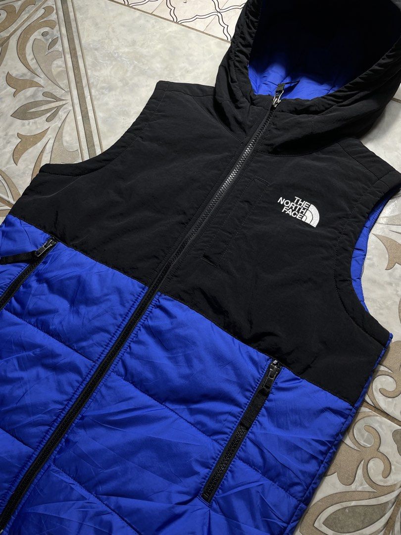 The North Face Vest Hooded (Category: Coats, Jackets and Outerwear) located in Quezon City. Submitted by renovare.196 (Listing ID 1465904930, Image 3). Description: The North Face Vest Hooded As New Condition Color Rate: 9.8/10 No Issue Authentic / Legit Measurements • Width: 20 • Length: 24.5 Price: 1500 obo DM IF INTERESTED📥.