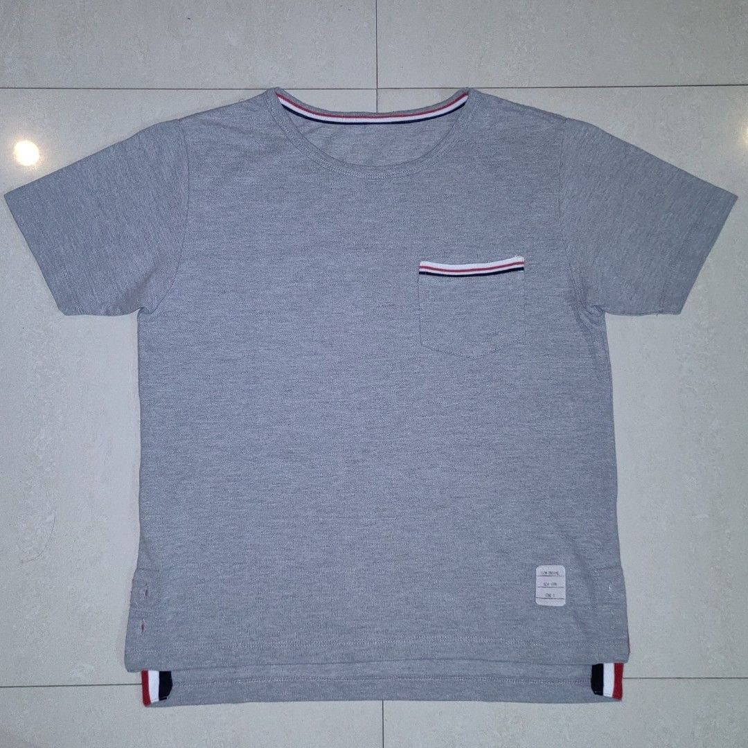 THOM BROWNE Jersey RWB Stripe Pocket Tee 'Light Grey' (Category: Shirts) located in Barotac Nuevo. Submitted by yorcollections (Listing ID 1465893667, Image 2). Description: THOM BROWNE Jersey RWB Stripe Pocket Tee 'Light Grey' Length 23 inches front; 24.5 inches back Width 19 inches 500php + sf.