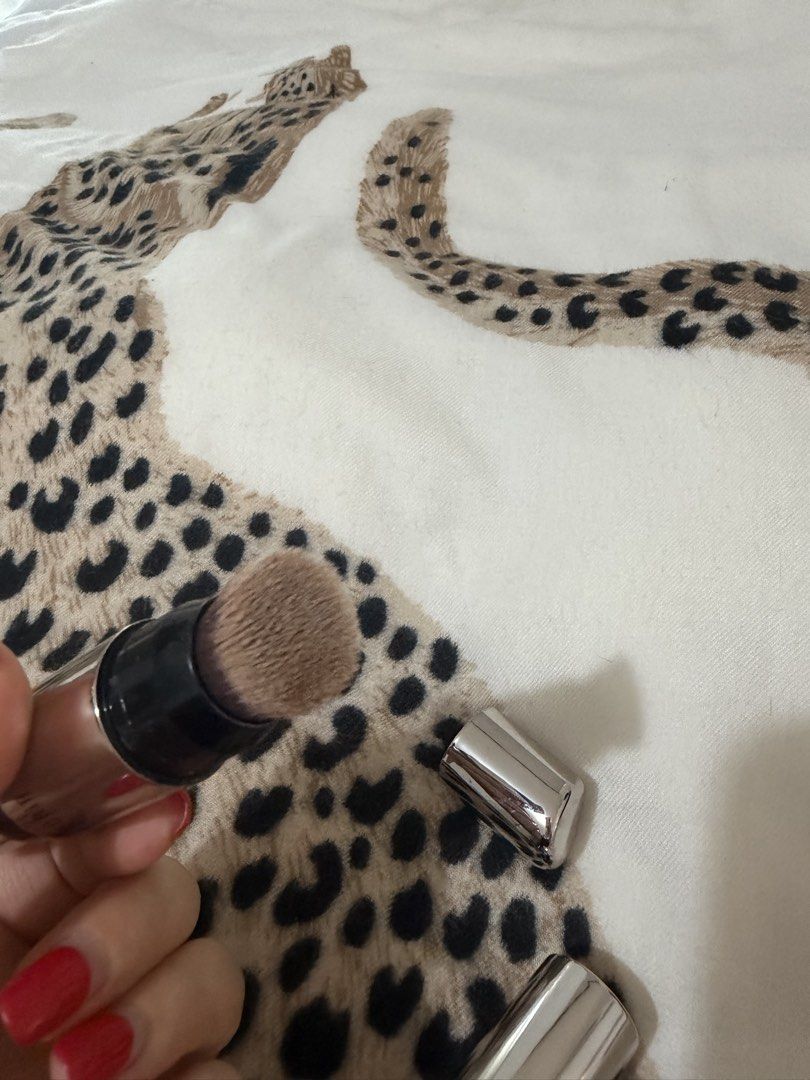Timephoria Contour and Highlight Stick with Brush (Category: Makeup) located in Manila. Submitted by mengxir20193848 (Listing ID 1465880636, Image 3). Description: - Brand/Model: Timephoria Dual-Ended Makeup Stick - Features: Creamy contour/foundation on one end and a built-in blending brush on the other - Packaging: Sleek silver metallic finish casing with printed branding - Convenience: Handy 2-in-1 design for fast and easy application on the g