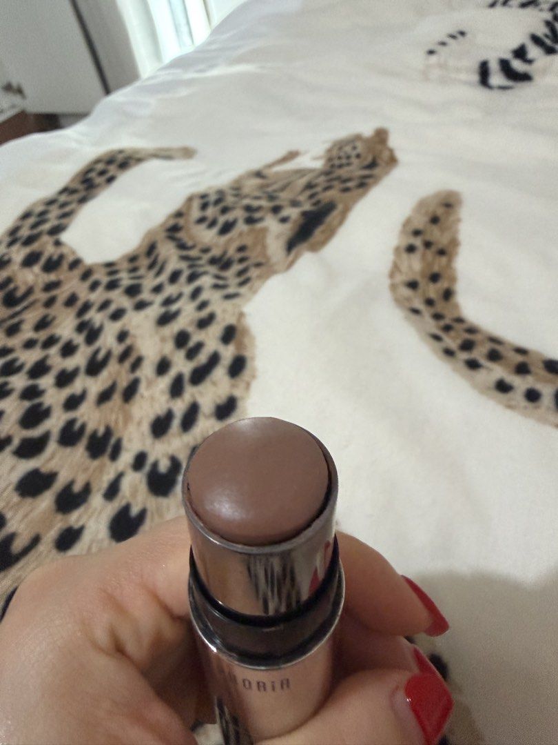 Timephoria Contour and Highlight Stick with Brush (Category: Makeup) located in Manila. Submitted by mengxir20193848 (Listing ID 1465880636, Image 2). Description: - Brand/Model: Timephoria Dual-Ended Makeup Stick - Features: Creamy contour/foundation on one end and a built-in blending brush on the other - Packaging: Sleek silver metallic finish casing with printed branding - Convenience: Handy 2-in-1 design for fast and easy application on the g