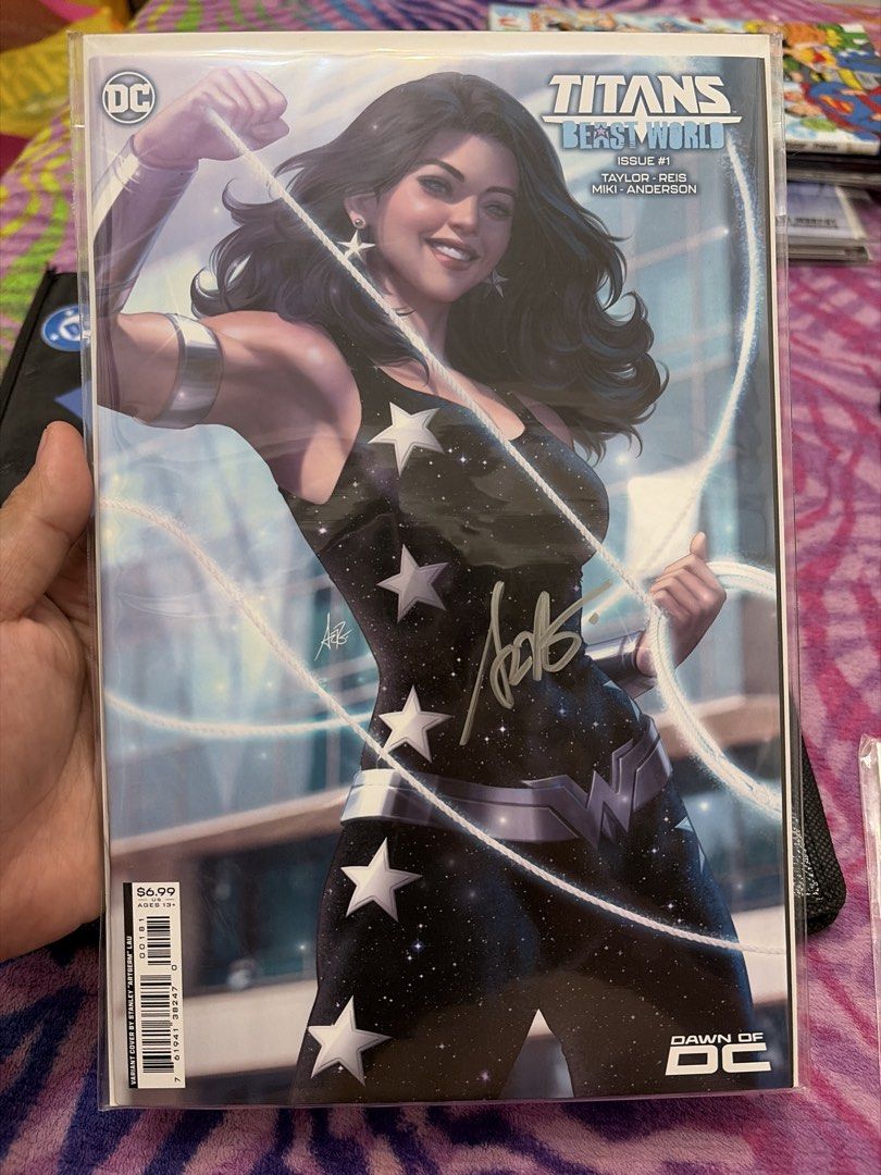 Titans Beast World Issue #1 (Signed by ArtGerm) (Category: Comics & Manga) located in Caloocan City. Submitted by percyreads (Listing ID 1465878034, Image 1). Description: Cover Art: Exclusive variant by Stanley Artgerm Lau Condition: Signed directly on the cover Protection: Stored safely inside a protective plastic sleeve bag .