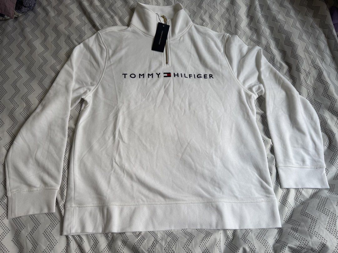 Tommy Hilfiger Half Zip Sweatshirt (Category: Announcements) located in Quezon City. Submitted by branded_jo (Listing ID 1465805454, Image 1). Description: Original Tommy Hilfiger Half Zip Sweatshirt for Women Large Size Color white Brand new with tag Bought in Canada Lalamove Ready.
