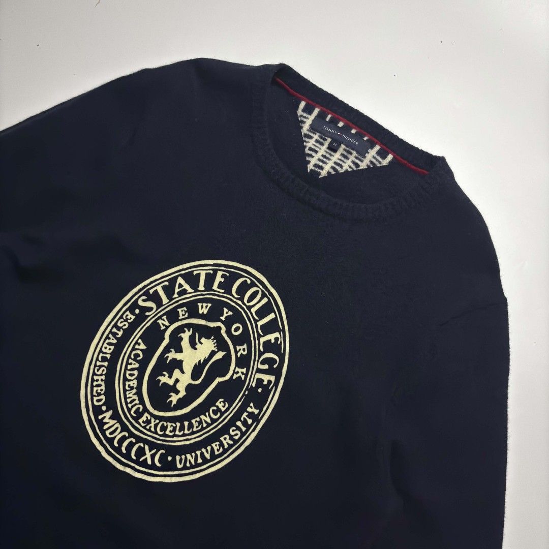 Tommy Hilfiger “State College” Crest Crewneck (Category: Coats, Jackets and Outerwear) located in San Pablo. Submitted by refitsph (Listing ID 1465826264, Image 2). Description: - Width: 20.5 - Length: 30.5 - Legit / Authentic - Flawless - Already Washed and Ready to Wear.