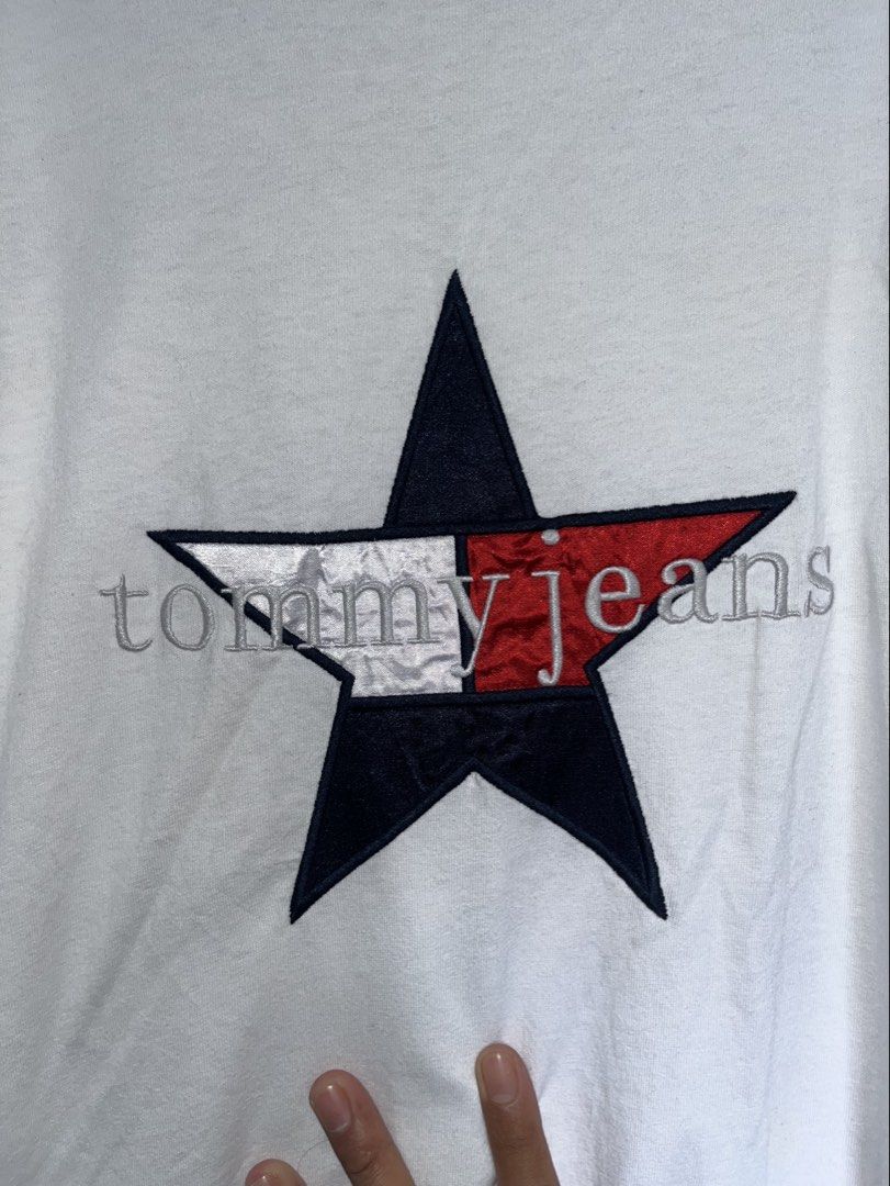 Tomnny Hilfiger jeans embroidered logo (Category: Activewear) located in Cebu City. Submitted by thrift.sht (Listing ID 1465819007, Image 3). Description: Tommy Hilger jeans embroidered logo Vintage T-shirt Excellent condition No issue Size: medium to large Color rate: 9.8/10 📍cebu city .