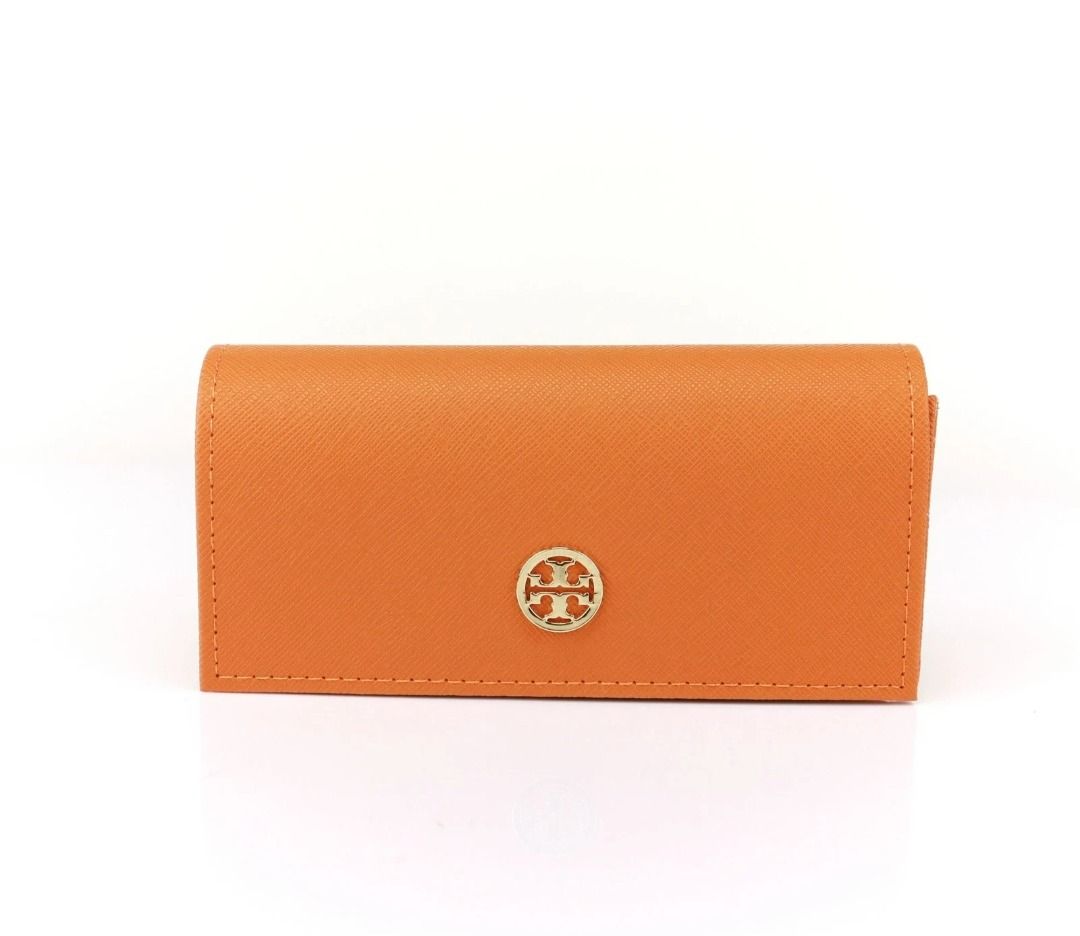 Tory Burch Orange Triangular Sunglass Eyeglass Case BNWOT (Category: Sunglasses & Eyewear) located in Las Pinas. Submitted by anonymously_shopaholic (Listing ID 1465921050, Image 3). Description: - Authentic Tory Burch hard eyeglass case in a vibrant bright orange, brand new without tag - Crafted from durable Saffiano leather texture with chic orange stitching - Features a polished gold metal logo emblem on the front flap, with protective film at