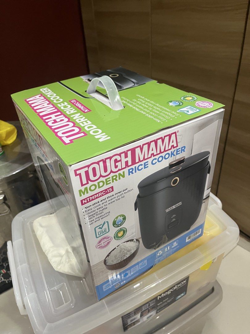 Tough Mama Modern Rice Cooker NTMMRC-15 5 Cup Capacity (Category: Cookers) located in Manila. Submitted by jericho_chan (Listing ID 1465786708, Image 2). Description: - Brand: Tough Mama (Model: NTMMRC-15) - Condition: Brand new, unopened, and sealed box - Capacity: Non-stick inner pot holds up to 5 cups - Design: Stylish matte black finish with elegant rose gold details and a carrying handle - Function: Simple push-button operation for cooking a