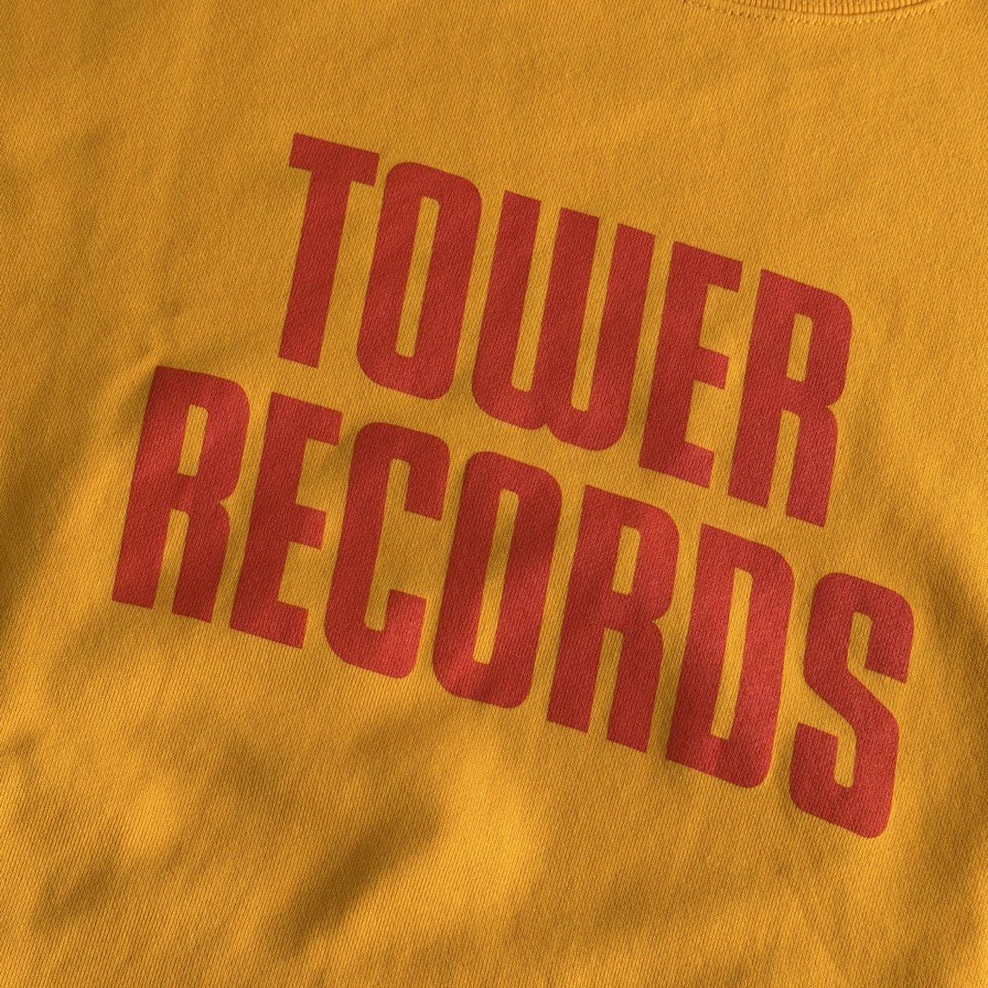 Tower Records Logo Crewneck Sweatshirt (Category: Coats, Jackets and Outerwear) located in Mabalacat. Submitted by philscabinet (Listing ID 1465844160, Image 2). Description: Tower Records Logo Crewneck Sweatshirt - Color: Bright yellow - Size: XXL - Material: Thick cotton crewneck with ribbed cuffs and hem - Condition: Never been used - Item was bought last December 2024 in Tower Records Shibuya - Includes Tower Records Plastic Bag Price is stil