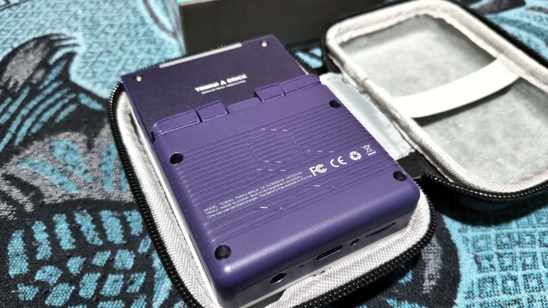 TrimUI BRICK Handheld Console Purple 4gb (Category: Others) located in Manila. Submitted by lauraarseid (Listing ID 1465893556, Image 3). Description: TrimUI BRICK Handheld gaming console Purple Color 4gb MicroSD NextUI OS Can play games UpTo PS1 and some PSP and Portmaster... Like New and Pristine Condition with tempered glass installed, all accessories and box, extra shoulder buttons and charger are unused. Also comes with official TrimUI Hard 
