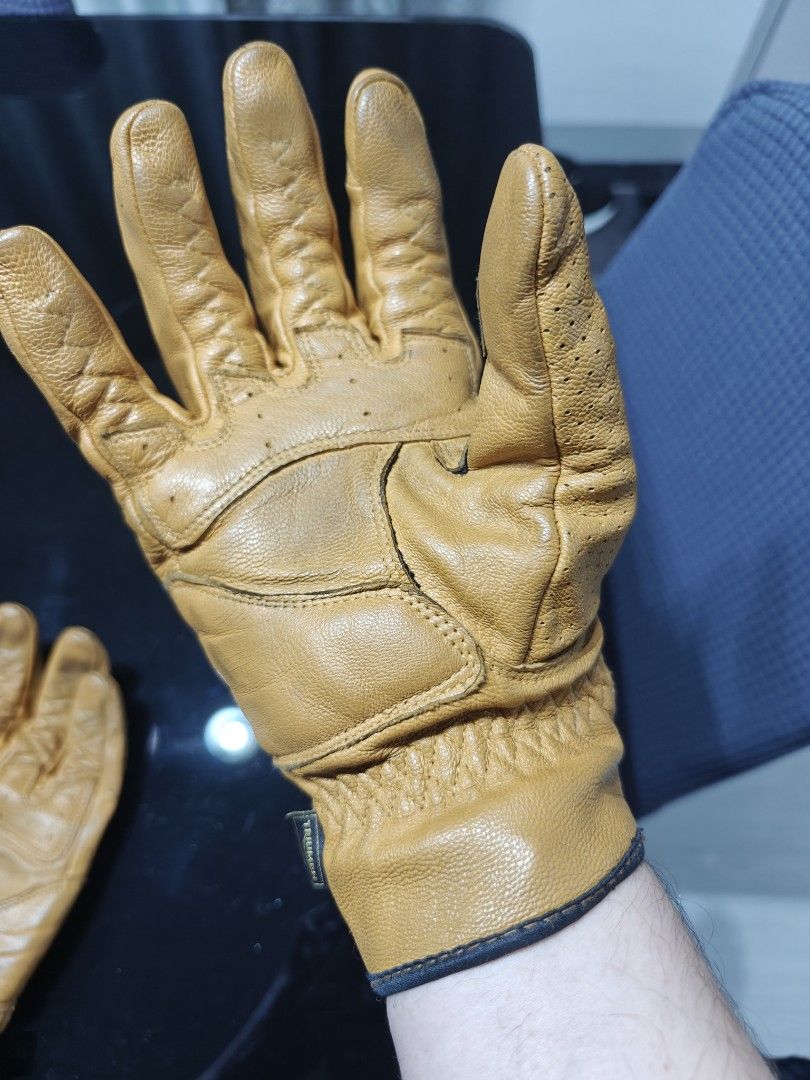 Triumph Harleston authentic leather motorcycle gloves (Category: Helmets and other Riding Gears) located in Manila. Submitted by _josevicente (Listing ID 1465900049, Image 2). Description: Size XL - Authentic Triumph leather motorcycle gloves - Built-in hard knuckle protection on the top side -CE certified, level 1 protection - Perforated leather sections on fingers and backhand for great airflow - Stylish quilted detailing around the wrist area 