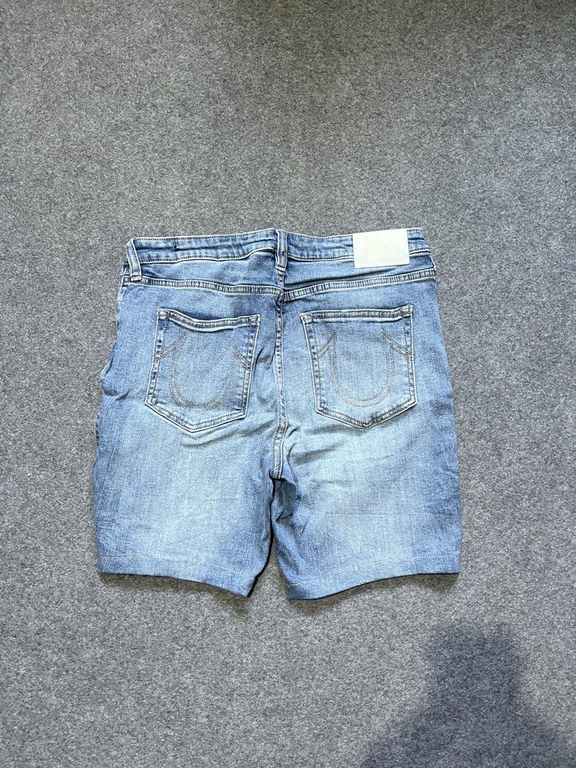 True religion denim short (Category: Shorts) located in Lapu Lapu. Submitted by jhonrener41426 (Listing ID 1459537032, Image 1). Description: Size 32 Length-18.5 Leg opening-10 Excellent condition Color rate 9.8/10 Authentic Cut washtag (declare authentic) Issue none .