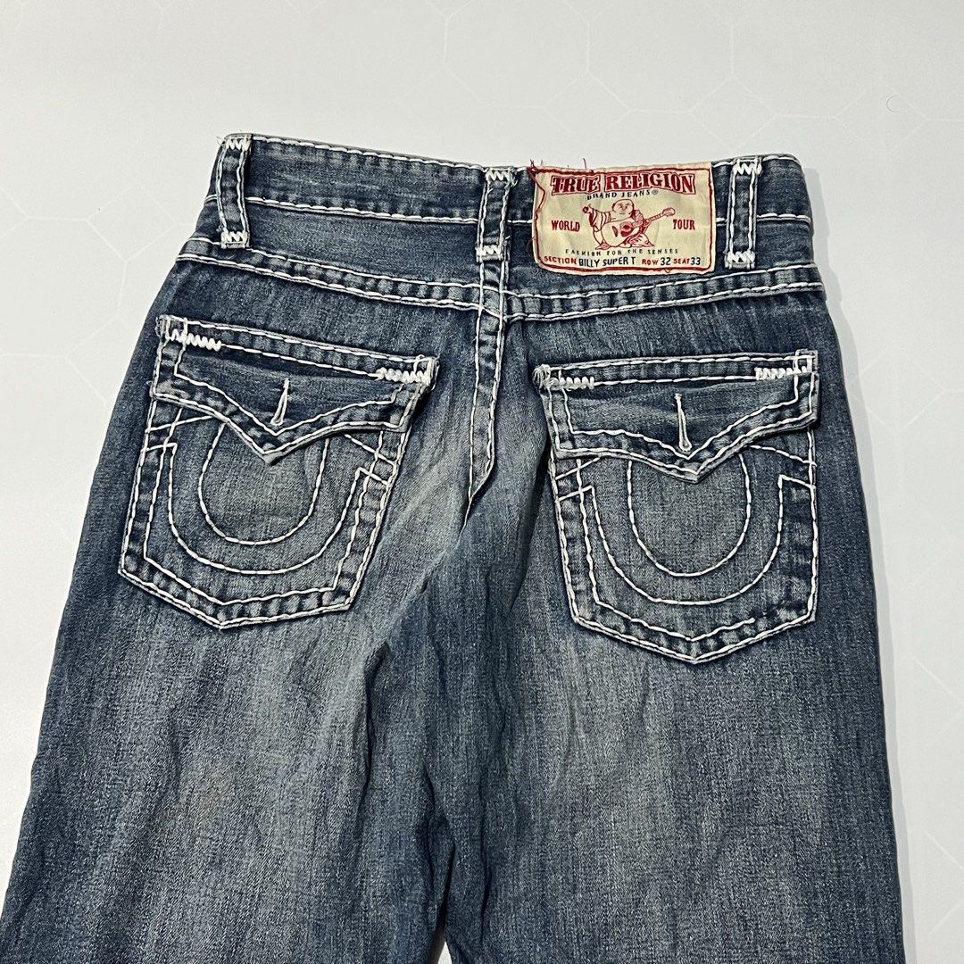 True Religion Thick Stitch Billy Super T (Category: Jeans) located in Caloocan City. Submitted by lostarchive_55 (Listing ID 1465914406, Image 3). Description: - Brand: True Religion - Style: Billy Super T - Wash: Classic blue denim - Details: Iconic thick white contrast stitching and signature horseshoe flap back pockets - Closure: Button fly - Size/Fit: Back leather patch indicates section 32, seat 33 - Condition: Excellent, ready to wear.