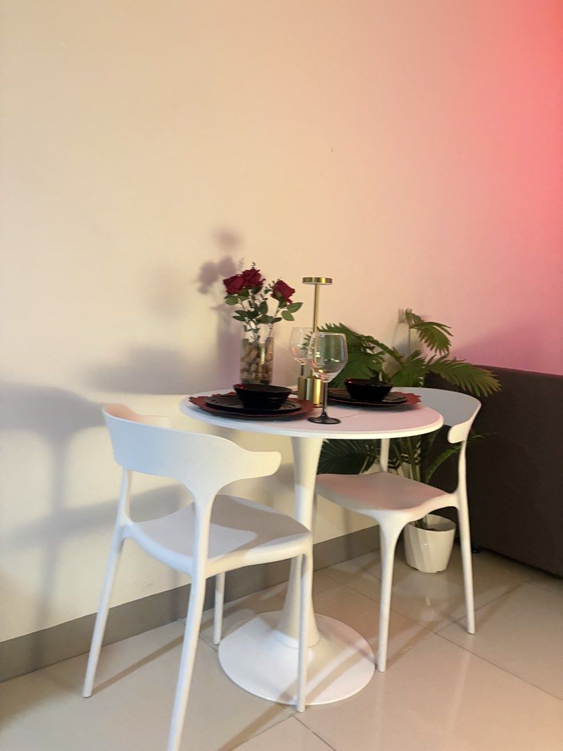Tulip White Round Dining Table with Two Chairs (Category: Tables & Sets) located in Manila. Submitted by ellavillan48506 (Listing ID 1465860996, Image 2). Description: Nordic table 70 cm - Set includes: 1 round white dining table and 2 modern white chairs - Compact size: Ideal for small dining spaces and cozy breakfast nooks - Design: Clean, minimalist aesthetic ready for your home setup Selling as set 2 months old No stains and scratches Like ne