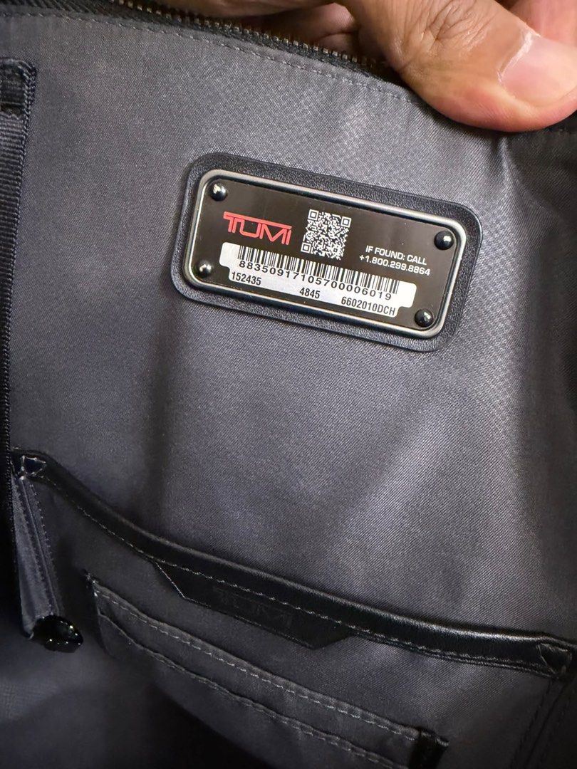 TUMI Harrison Grey Backpack (Category: Backpacks) located in Manila. Submitted by jonkakkee (Listing ID 1465846640, Image 3). Description: - Authentic Tumi backpack in dark grey textured fabric - Premium black leather trim on the bottom and top handle - Secure double zip main compartment & front zip pocket with logo plate - Includes side luggage tag & Tumi Tracer metal plate with barcode - Comfortable, padded, and adjustable back straps - Clean i