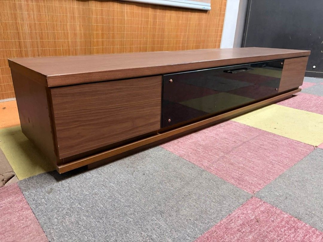 Tv Rack UpTo 80" (Category: TV Consoles) located in Meycauayan. Submitted by marygracecasimiro (Listing ID 1465850572, Image 1). Description: 😍UPTO 80-INCH TV!!! LONG Modern Tv Rack Cabinet with Drawers Central Black Glass Drop Down Cabinet SLEEK DESIGN!!! UPTO 80-INCH TV!!! *SEE VIDEO COMMENT ✅Price : ₱11,000 only ✅ 71L x 17W x 13H inches In VERY good condition♥️.