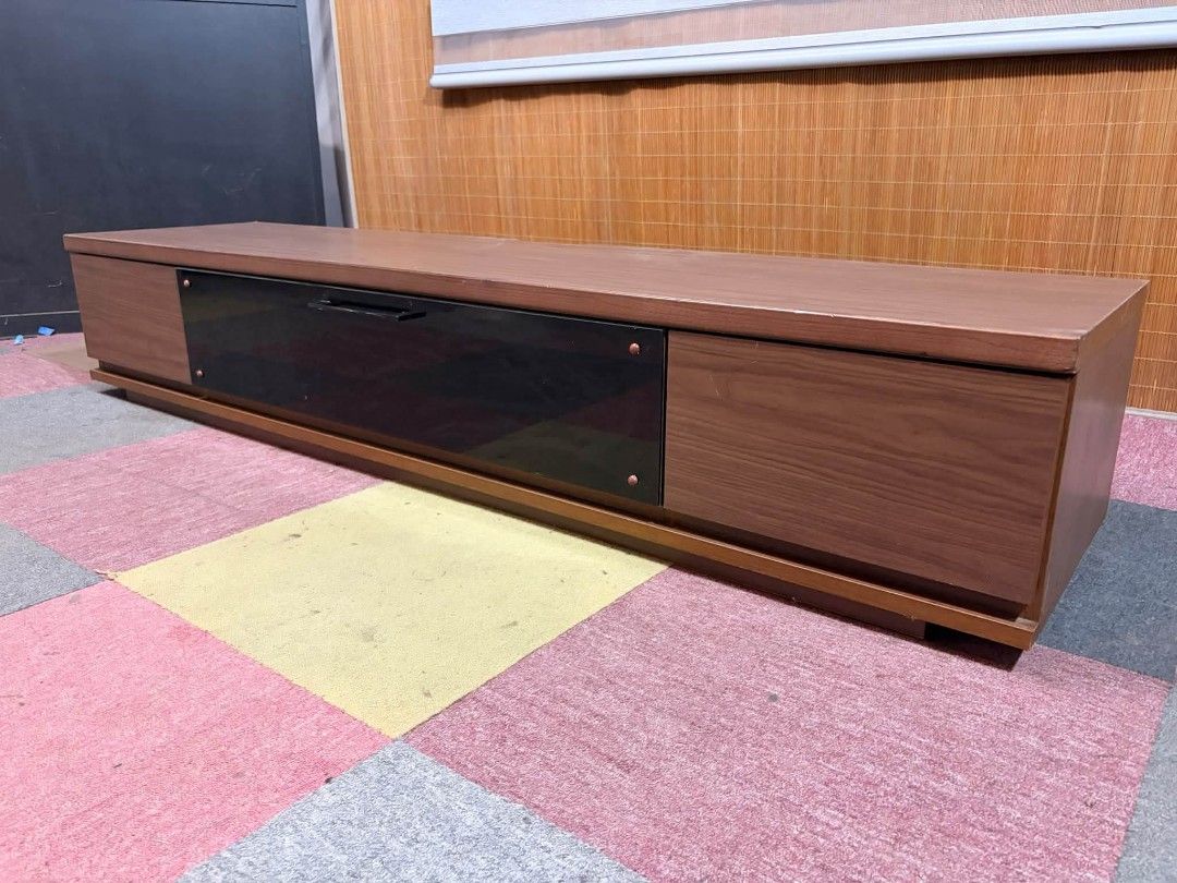 Tv Rack UpTo 80" (Category: TV Consoles) located in Meycauayan. Submitted by marygracecasimiro (Listing ID 1465850572, Image 3). Description: 😍UPTO 80-INCH TV!!! LONG Modern Tv Rack Cabinet with Drawers Central Black Glass Drop Down Cabinet SLEEK DESIGN!!! UPTO 80-INCH TV!!! *SEE VIDEO COMMENT ✅Price : ₱11,000 only ✅ 71L x 17W x 13H inches In VERY good condition♥️.
