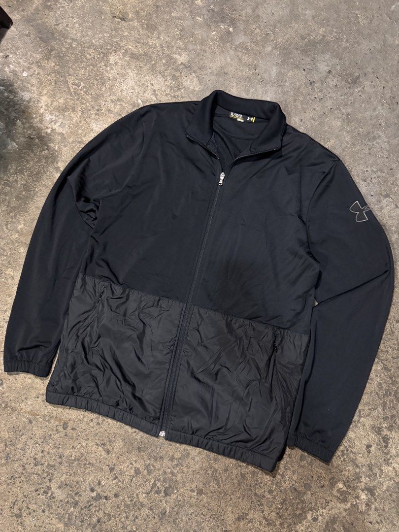 Under Armour Black Full Zip Jacket XL (Category: Coats, Jackets and Outerwear) located in Pasig City. Submitted by dripthrift1600 (Listing ID 1465949816, Image 1). Description: - Brand: Under Armour - Item: Full-Zip Athletic Jacket - Color: Solid Black - Size: XL (Loose Fit) - Design: Smooth upper body with crinkled nylon lower panels - Features: Secure zipped pockets, high mock neck collar, elasticated cuffs and hem - Branding: Subtle logo on le