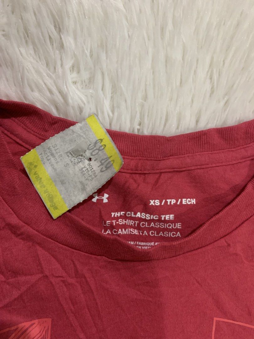 Under Armour Classic Tee pink XS (Category: Shirts) located in Iba. Submitted by thriftcoyan (Listing ID 1465773316, Image 3). Description: - Brand: Under Armour - Item: Women's classic activewear tee - Color: Pink - Size: XS - Design: Short sleeves, round neckline, large logo graphic on front - Condition: Brand new with natural wrinkles from storage (easy to iron out) - Perfect for: Workouts, gym sessions, or casual everyday wear.