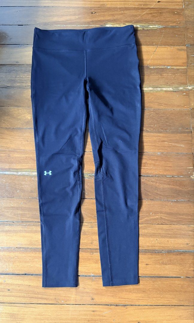 Under Armour Compression Leggings Medium Black (Category: Activewear) located in Quezon City. Submitted by bonkee_declutters (Listing ID 1465790857, Image 1). Description: - Color: black - Fabric: Smooth and stretchy with minimal wear - Key Features: Textured ribbed panels behind knees for extra flexibility - Storage: Small zippered pocket at the back waistband - Safety: Reflective strips near lower shins for night running RFS: not using it anymo