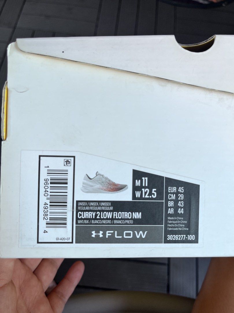 Under Armour Curry 2 Low Flotro NM (Category: Sneakers) located in Manila. Submitted by jcloyd (Listing ID 1465768617, Image 1). Description: - Model: Under Armour Curry 2 Low Flotro NM - Size: Men's 11 / Women's 12.5 / EUR 45 - Colorway: White base with black, pink, and orange gradient splatter on the toe box - Performance: Lightweight and grippy Flow technology sole unit - Inclusion: Comes with the original box - Condition: Brand new / pristine