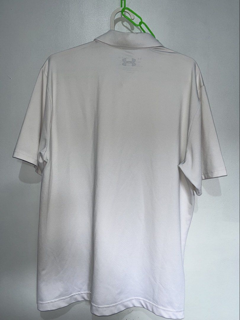 Under armour polo shirt (Category: Activewear) located in Cebu City. Submitted by thrift.sht (Listing ID 1465791275, Image 2). Description: Under armour polo shirt Color rate: 9.8/10 Excellent condition No issue 📍cebu city.