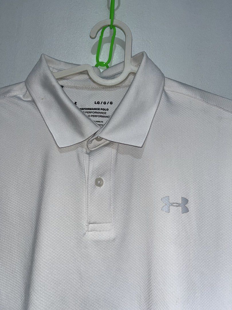 Under armour polo shirt (Category: Activewear) located in Cebu City. Submitted by thrift.sht (Listing ID 1465791275, Image 3). Description: Under armour polo shirt Color rate: 9.8/10 Excellent condition No issue 📍cebu city.