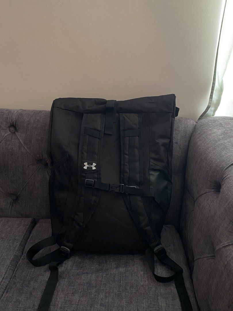 Under Armour Roll Top Sackpack (Category: Backpacks) located in Davao. Submitted by sellsell2002 (Listing ID 1465761061, Image 2). Description: Under Armour Roll Top Sackpack In Black Like new condition No flaws Pwede pang ride,hike,office etc. Waterproof .