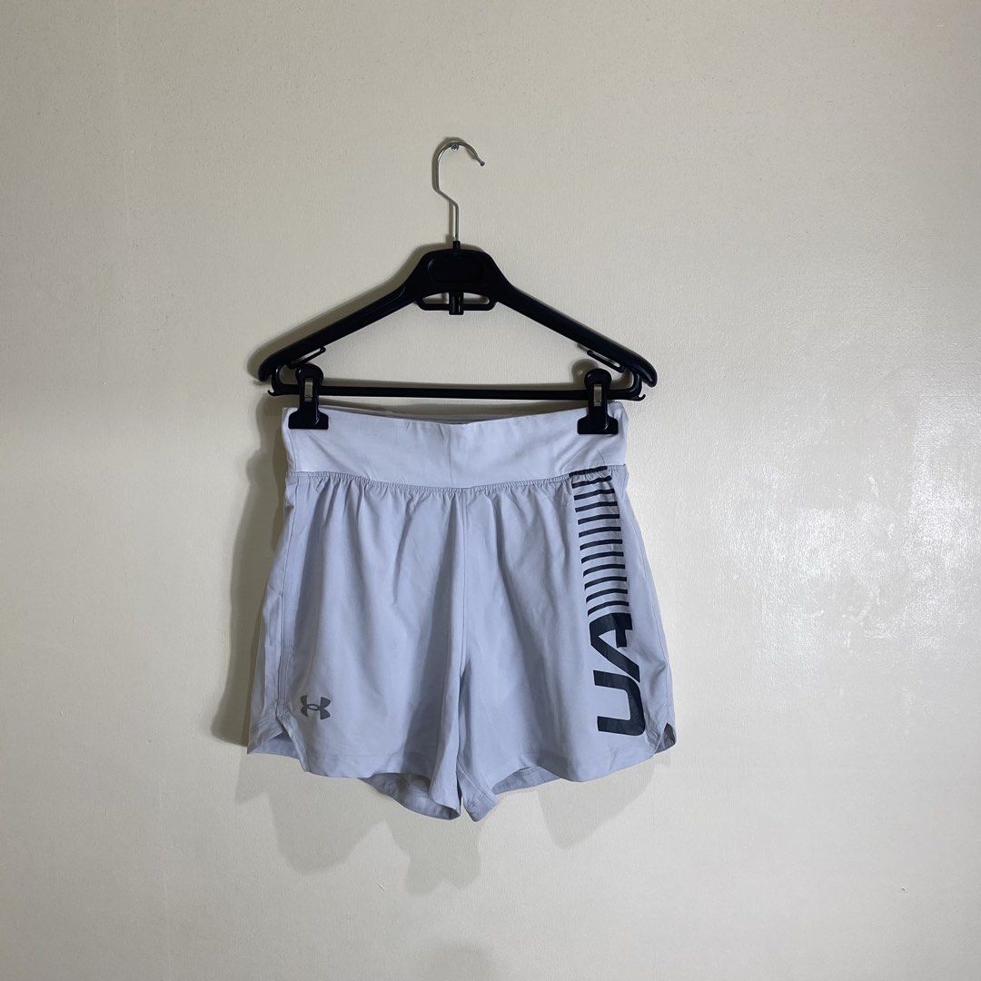 Under Armour Speedpocket Fitted Shorts White MD (Category: Shorts) located in Manila. Submitted by carbertjakosalem (Listing ID 1465895392, Image 1). Description: - Brand: Under Armour - Item: Running shorts - Size: Medium - Fit: Fitted style - Color: White - Features: Built-in black Speedpocket waistband for secure phone storage, bold UA graphic logo on the left leg, and subtle logo on the right hem - Material: Lightweight performance fabric - O