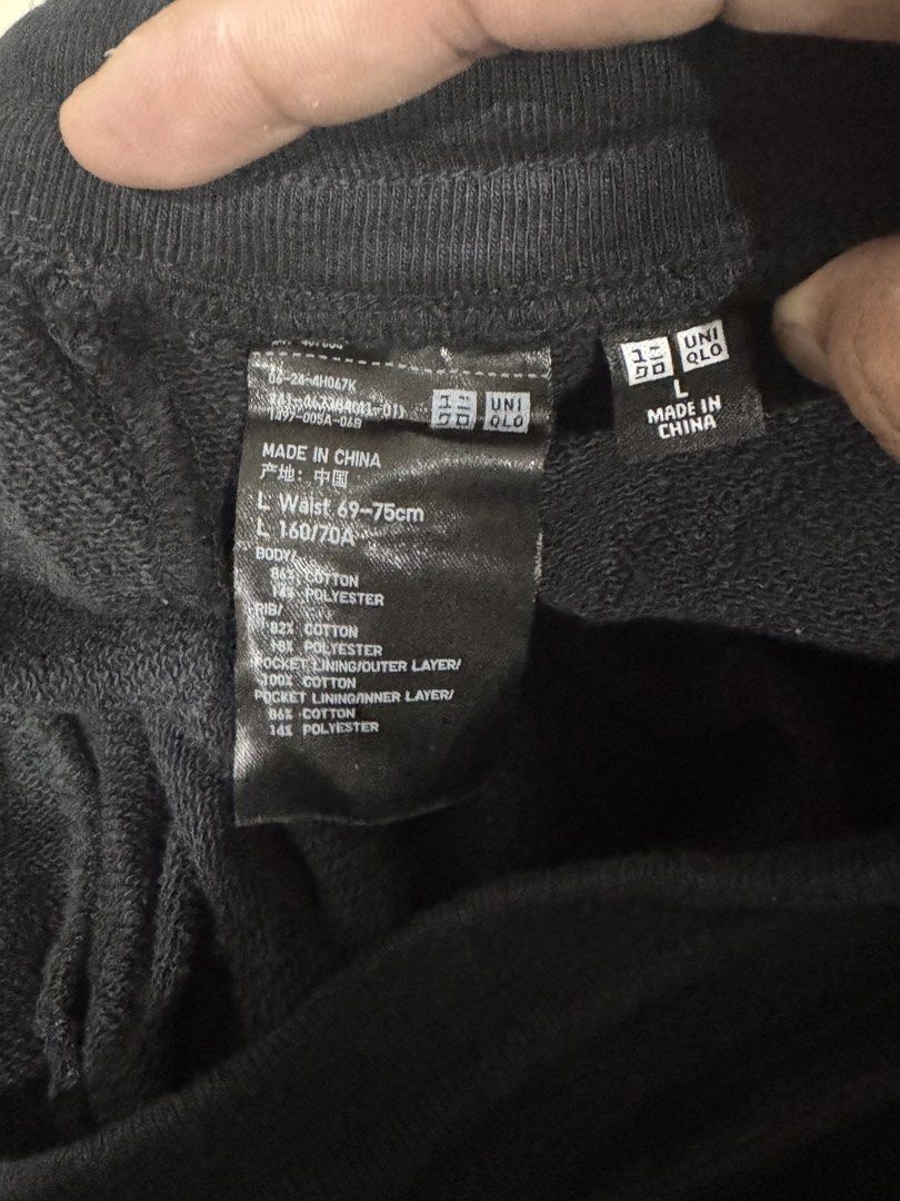 Uniqlo Black Cargo Sweatpants Size L (Category: Joggers) located in Lipa City. Submitted by cokelight11 (Listing ID 1465780785, Image 3). Description: - Brand: Uniqlo - Color: Black - Size: L (Waist: 69-75cm) - Material: Comfortable cotton and polyester blend - Features: Practical side cargo pockets and adjustable elastic drawstrings at the hem - Style: Versatile streetwear piece that is easy to style, wear loose or cinched.
