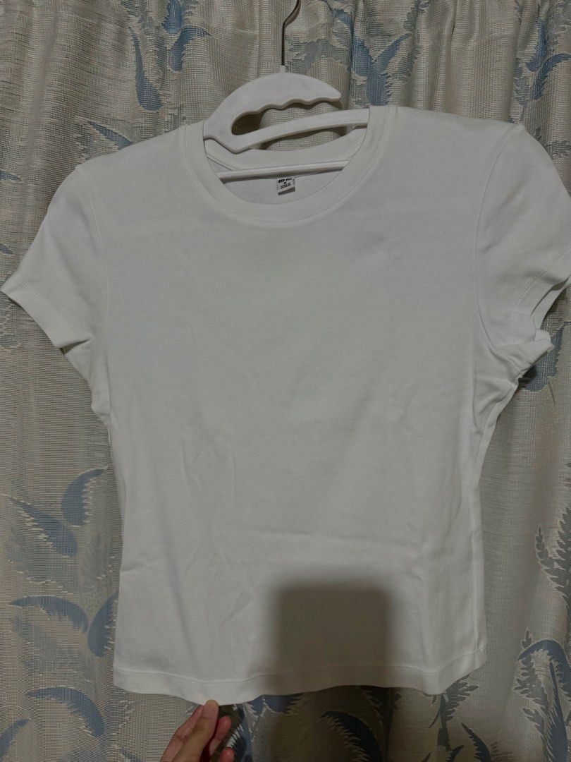 Uniqlo white croptop (Category: Shirts) located in Rizal. Submitted by lmbelle (Listing ID 1465938668, Image 1). Description: .