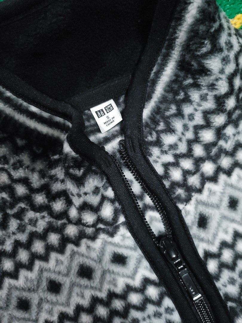 Uniqlo Grey Fair Isle Pattern Zip Fleece Jacket (Category: Coats, Jackets and Outerwear) located in Pasay City. Submitted by zildsebas (Listing ID 1465927391, Image 2). Description: - Brand: Uniqlo - Color: Grey and black with Fair Isle pattern - Size: Small (S) - Design: Full zip front, high collar, two side pockets - Material: Soft, warm fleece - Condition: Standard fit with clean interior tags Location : San Pablo Laguna Mode of payment : Gcas