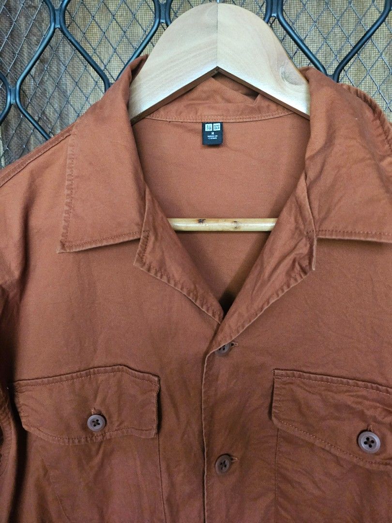 Uniqlo open collar shirt (Category: Formal Shirts) located in Pasig City. Submitted by a.ejs. (Listing ID 1465840569, Image 2). Description: Uniqlo open collar shirt Rust Medium, 23 x 28 Used, very good condition 300.