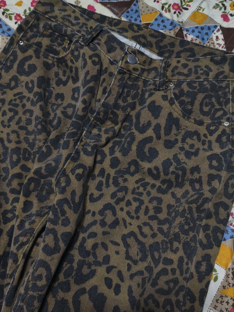 Unisex Leopard Denim Pants (Category: Jeans) located in Las Pinas. Submitted by dnbrbnt (Listing ID 1465814713, Image 2). Description: size 31 highwaist length 38 loc. las piñas.