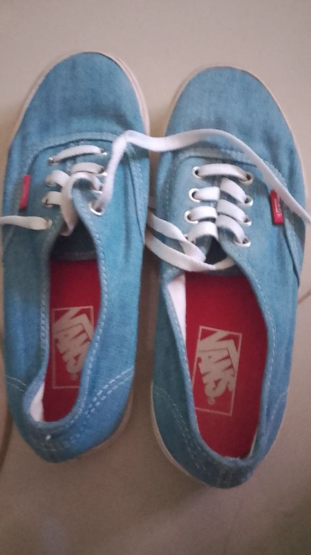 Unisex Vans Authentic Blue Canvas Sneakers (Category: Sneakers) located in Caloocan City. Submitted by happyrabbit-cb3c5a (Listing ID 1465829174, Image 1). Description: - Brand: Vans - Style: Classic low-top sneakers - Color: Blue canvas with white laces - Details: Red insoles with logo branding and red tag on the side - Condition: Clean and ready to wear - Perfect for casual days out.