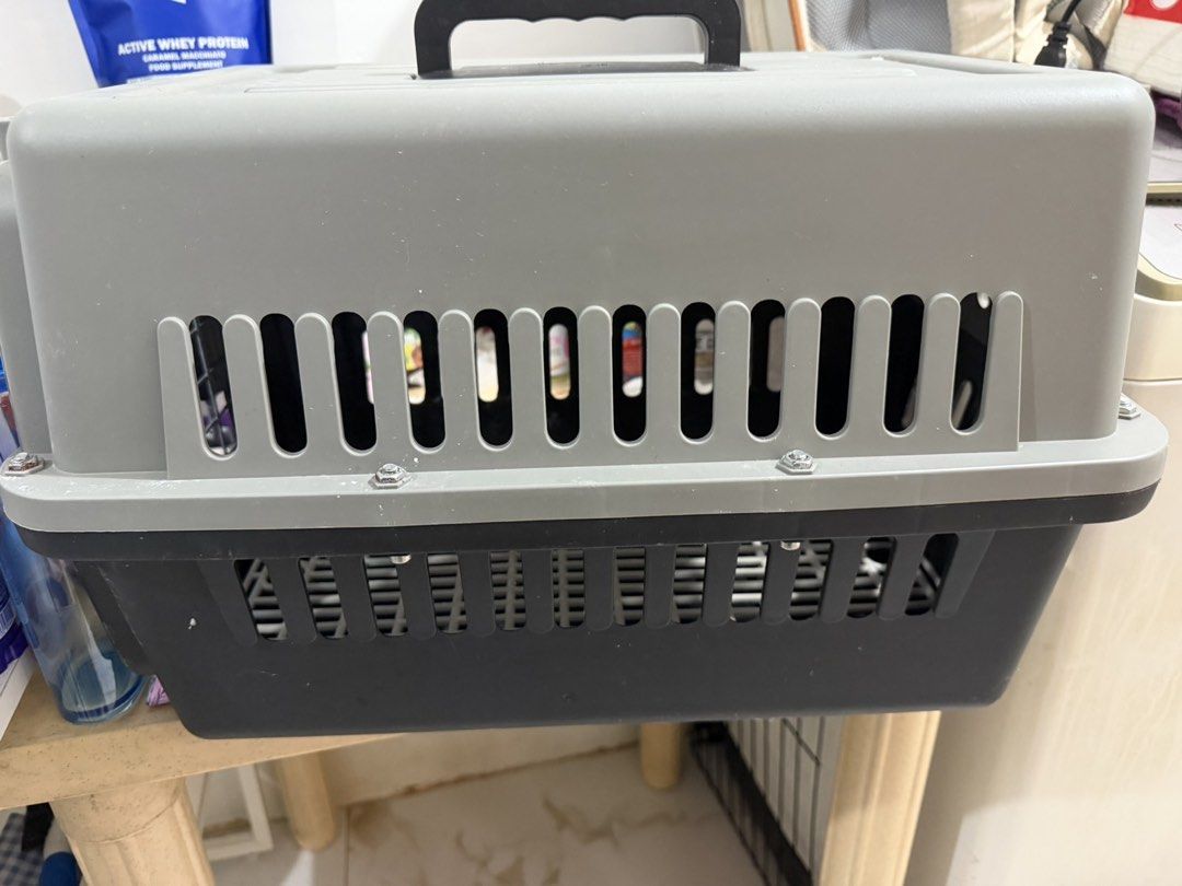 Used Pet Carrier / Bag (Category: Homes & Other Pet Accessories) located in Manila. Submitted by shaieee (Listing ID 1465939062, Image 1). Description: Used pet carrier and bag Pet carrier - Good for small pets. Used only once Condition: No issue at all, needs clean lang Price: 300 Pet shoulder bag (gray) - Used twice only. Size is 45x27x27 cm Price: 250 Pet carrier backpack - Used pero medyo madumi na and may konting chip leather. All zippers ar