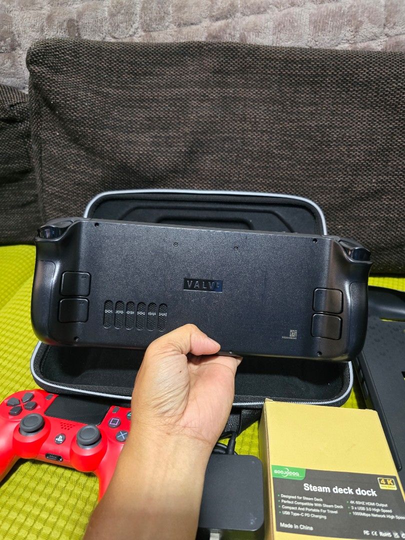 Valve Steam Deck Bundle with Dock and Controller (Category: Others) located in Caloocan City. Submitted by jesonvillegas (Listing ID 1465807816, Image 2). Description: - Goojodoq Steam Deck dock for easy TV connection - Bright red PS4 wireless controller included - Original power adapter and sturdy protective case - Perfect bundle for gaming on the go or docked at home - Everything shown in the photos is included in the package.